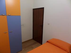 A bed or beds in a room at Casa Ferrara