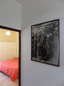 A bed or beds in a room at Casa Ferrara