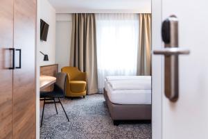 Katil atau katil-katil dalam bilik di Boutique Hotel Zach