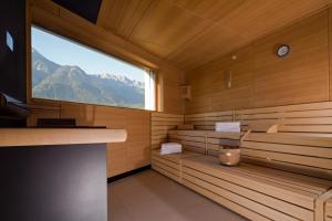 a sauna with a view of a mountain at Hotel Penz West in Innsbruck
