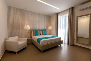 Katil atau katil-katil dalam bilik di Amalfi - Positano Home & Breakfast