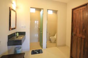 Ein Badezimmer in der Unterkunft Nyoman Villa Sanur