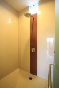 Ein Bett oder Betten in einem Zimmer der Unterkunft Nyoman Villa Sanur