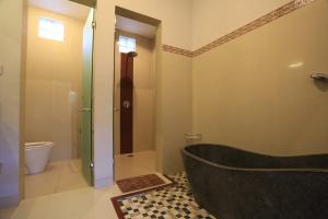 Ein Badezimmer in der Unterkunft Nyoman Villa Sanur