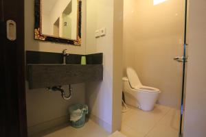 Ein Badezimmer in der Unterkunft Nyoman Villa Sanur