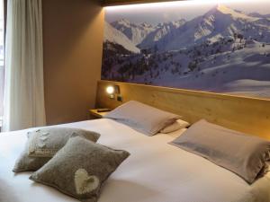 Postel nebo postele na pokoji v ubytování Hotel Compagnoni
