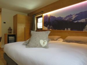 Postel nebo postele na pokoji v ubytování Hotel Compagnoni