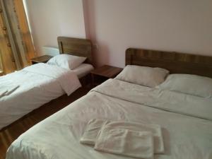 Postel nebo postele na pokoji v ubytování NNN Tourist