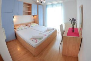 Apartments Majić客房内的一张或多张床位