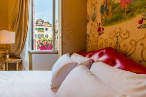 Un ou plusieurs lits dans un hébergement de l'établissement Hotel Santo Stefano