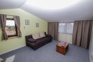 Ein Sitzbereich in der Unterkunft Guest House Katarina