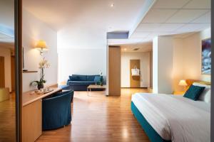 Postel nebo postele na pokoji v ubytování Vital Hotel Flora