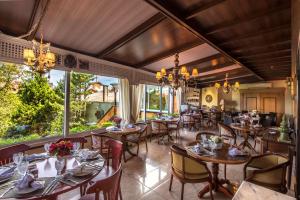 Um restaurante ou outro lugar para comer em Hotel Casa da Montanha