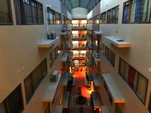 an overhead view of a hallway in a school building at Cedar Peak Condominium by Tripsters Hub in Baguio