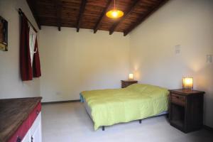 En eller flere senge i et værelse på Mahatma Villa Giardino + 32 billeder