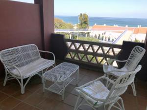 En balkong eller terrass på New ! Manilva Playa SPA Resort 2/2 sea view apartment