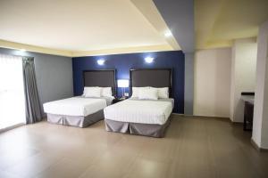 Voodi või voodid majutusasutuse Hotel Ha toas