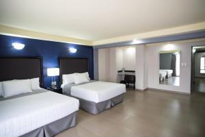 Voodi või voodid majutusasutuse Hotel Ha toas