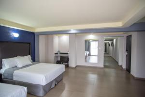 Voodi või voodid majutusasutuse Hotel Ha toas