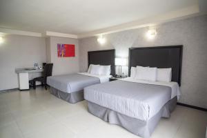 Postel nebo postele na pokoji v ubytování Hotel Ha + 37 fotografií
