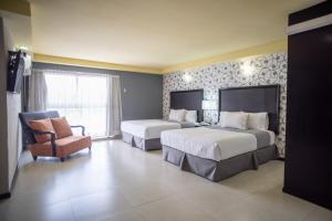 Voodi või voodid majutusasutuse Hotel Ha toas