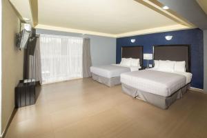 Voodi või voodid majutusasutuse Hotel Ha toas