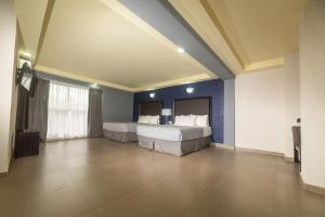 Voodi või voodid majutusasutuse Hotel Ha toas