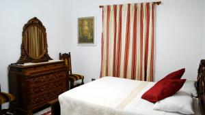 Giường trong phòng chung tại Carpinone Monte