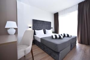 Postel nebo postele na pokoji v ubytování Apartments 110 in Budva
