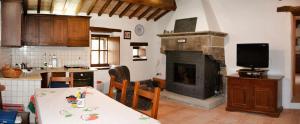 Kuchyň nebo kuchyňský kout v ubytování Agriturismo Le Case