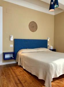 Кровать или кровати в номере Orto al Mare Room Rental