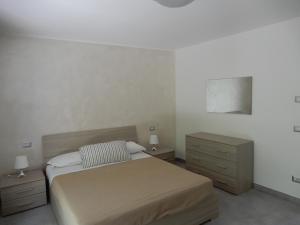 A bed or beds in a room at casa vacanze lucianoandson