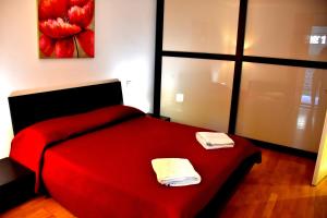 Postel nebo postele na pokoji v ubytování Taormina Sunny Apartment - Taormina Holidays