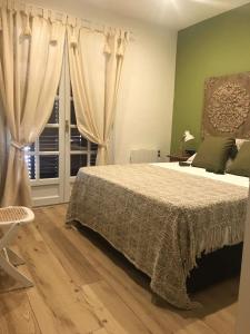 Posteľ alebo postele v izbe v ubytovaní Apartament Neret II