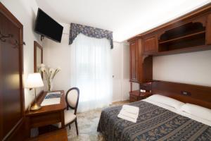 Postel nebo postele na pokoji v ubytování Hotel La Giara