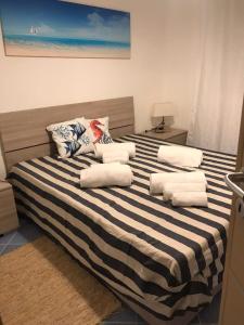 Кровать или кровати в номере Villa Azzurra