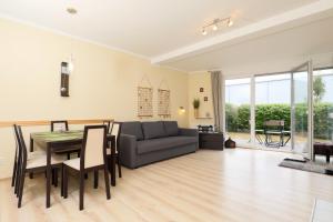 Fotografie z fotogalerie ubytování Jantar Apartamenty - Rodzinny apartament z ogrodem v destinaci Grzybowo