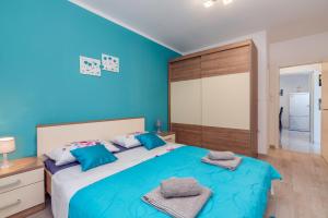Posteľ alebo postele v izbe v ubytovaní Guest House Ravnić