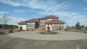 a large house with a circular driveway at Casale in Forest Grove