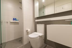 A bathroom at Docklands Brand New 1 Bedroom Apt@Marina Tower