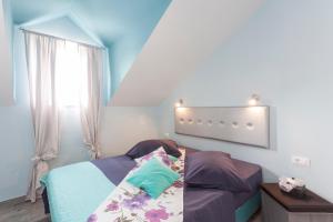 Postel nebo postele na pokoji v ubytování Luxury Apartments Marhella & Jakov