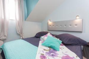 Postel nebo postele na pokoji v ubytování Luxury Apartments Marhella & Jakov