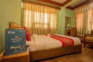 Postel nebo postele na pokoji v ubytování Hotel Green Orchid