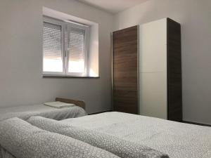 Postel nebo postele na pokoji v ubytování Croatia Mandre