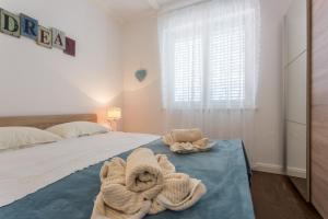 Posteľ alebo postele v izbe v ubytovaní Studio Villa Ivka