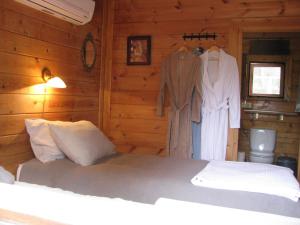 Ένα ή περισσότερα κρεβάτια σε δωμάτιο στο Finca Lliber