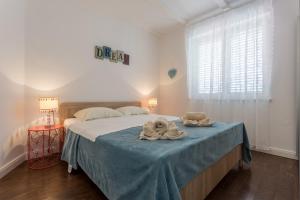 Posteľ alebo postele v izbe v ubytovaní Studio Villa Ivka