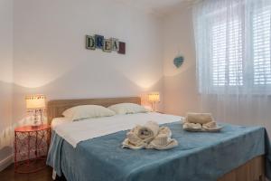 Posteľ alebo postele v izbe v ubytovaní Studio Villa Ivka