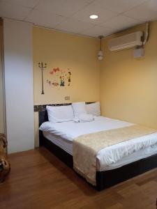 Postel nebo postele na pokoji v ubytování Pu Shi Homestay + 16 fotografií