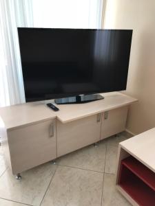 TV a/nebo společenská místnost v ubytování Apartment Vita Moela 23 & 24